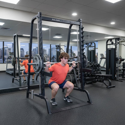 Body-Solid GS348B Series 7 Smith Machine man exercising