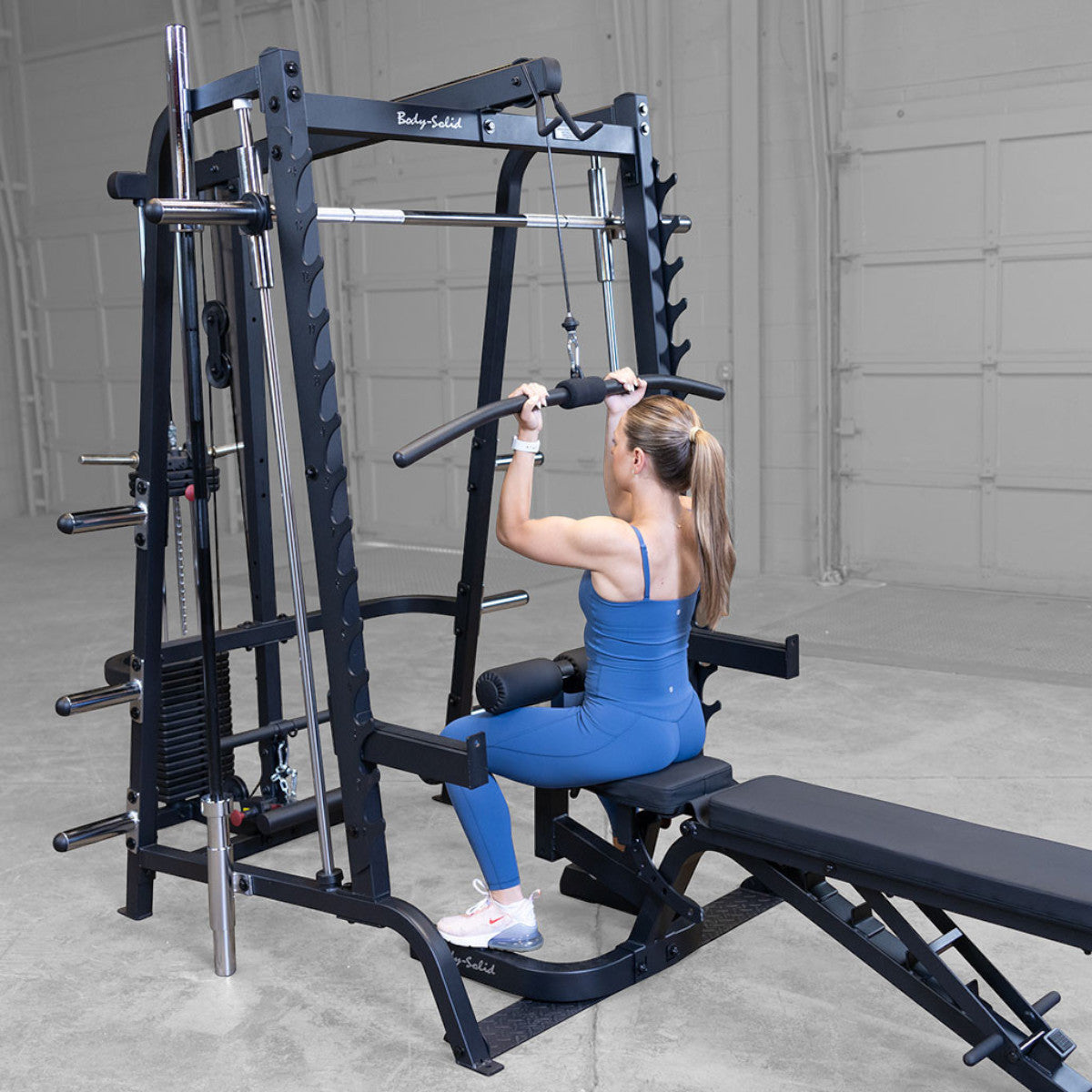 Body-Solid GS348BP4 Series 7 Smith Gym Package woman exercising