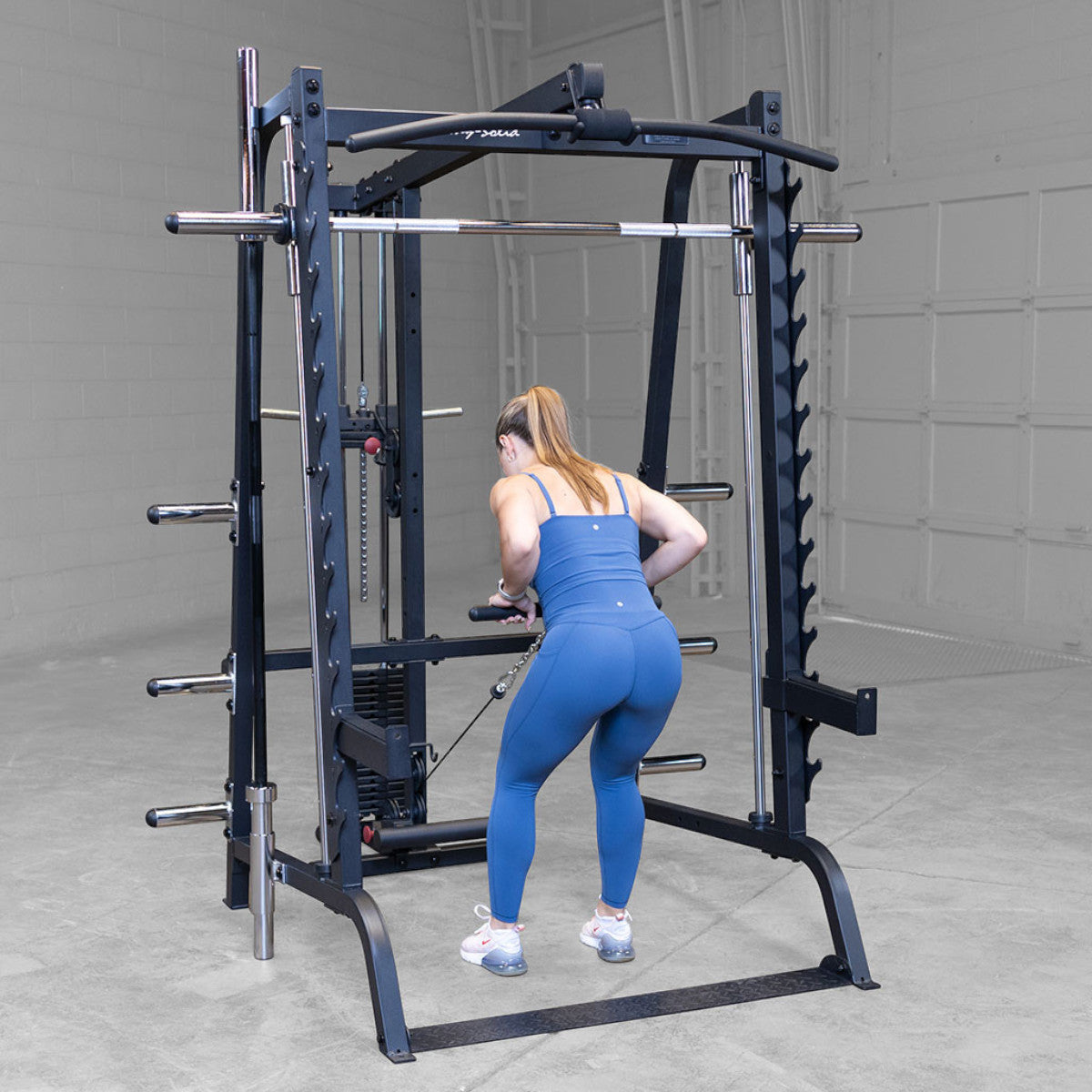 Body-Solid GS348BP4 Series 7 Smith Gym Package woman exercising