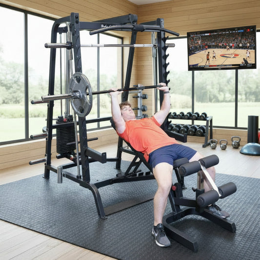 Body-Solid GS348BP4 Series 7 Smith Gym Package man exercising