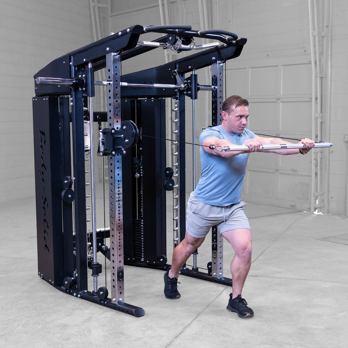 Body-Solid GFSR100 All-in-One Smith Machine / Functional Trainer man exercising
