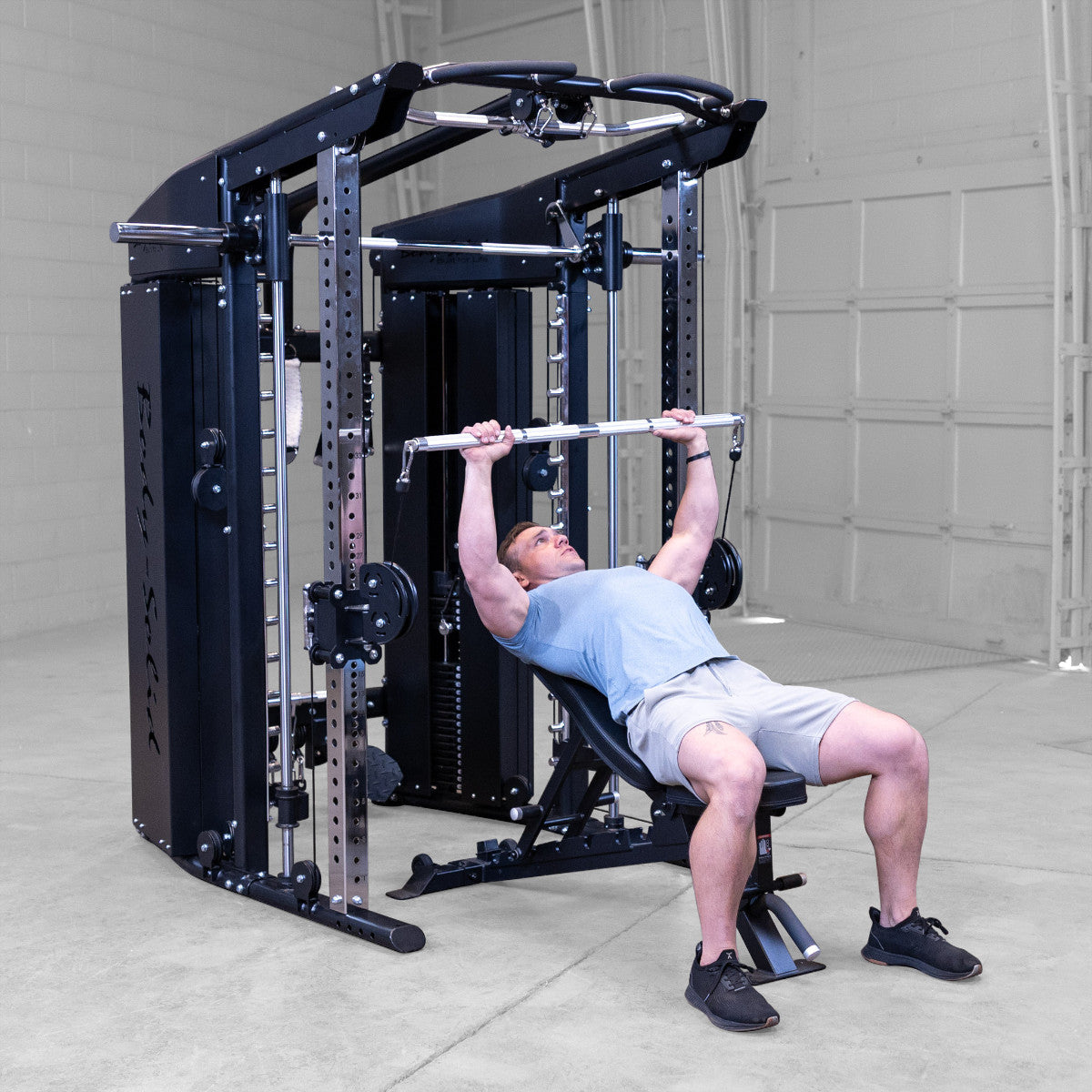 Body-Solid GFSR100 All-in-One Smith Machine / Functional Trainer man exercising
