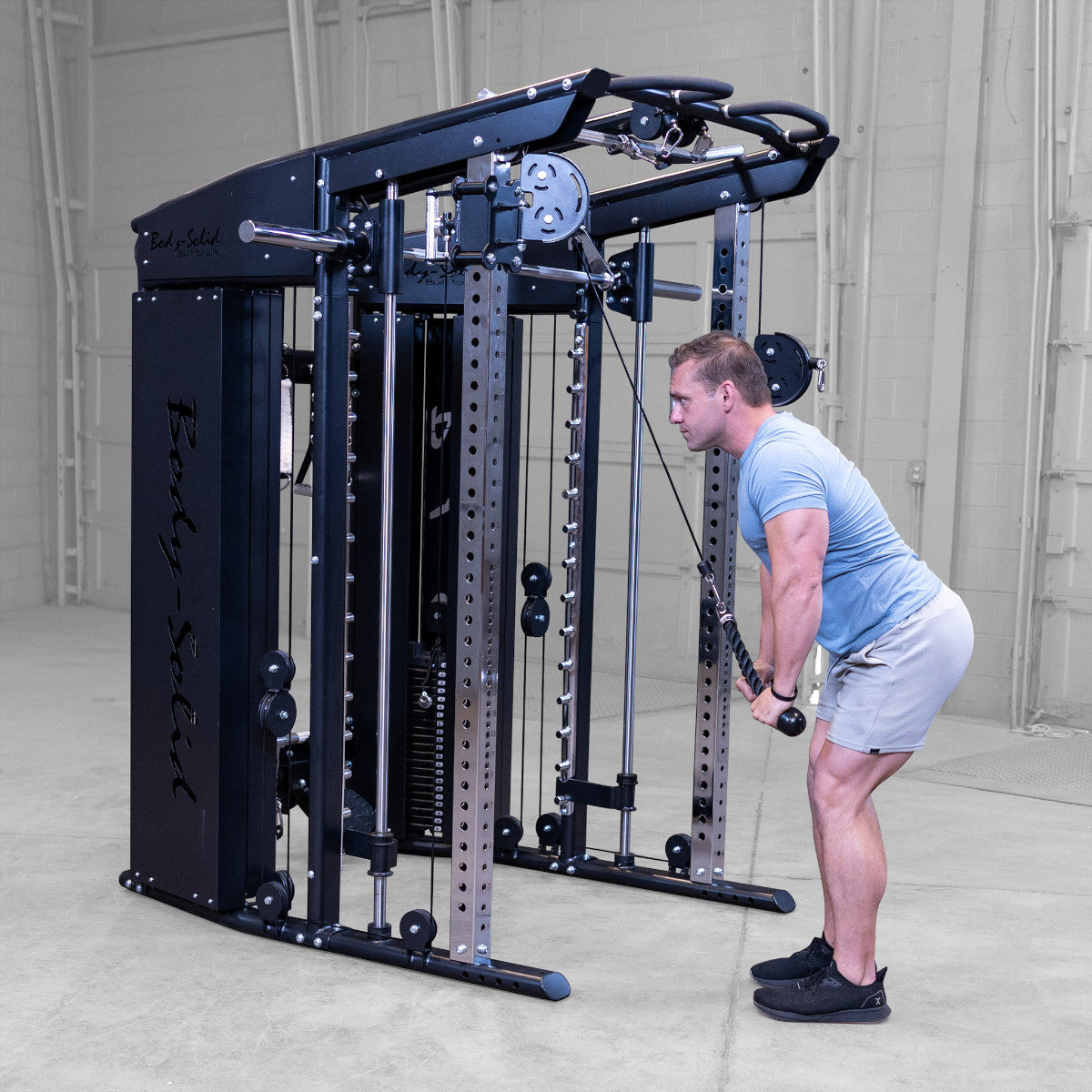 Body-Solid GFSR100 All-in-One Smith Machine / Functional Trainer man exercising