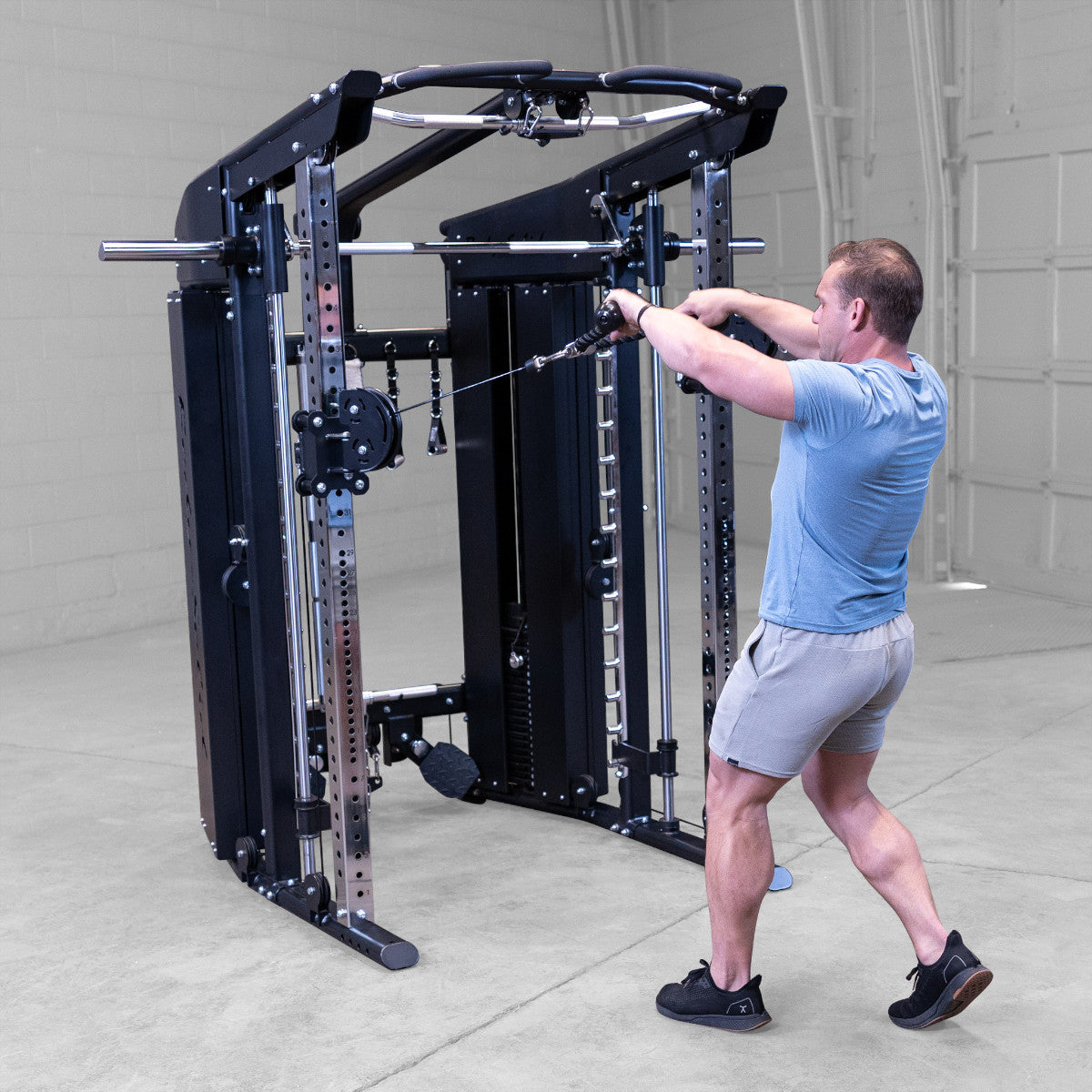 Body-Solid GFSR100 All-in-One Smith Machine / Functional Trainer man exercising