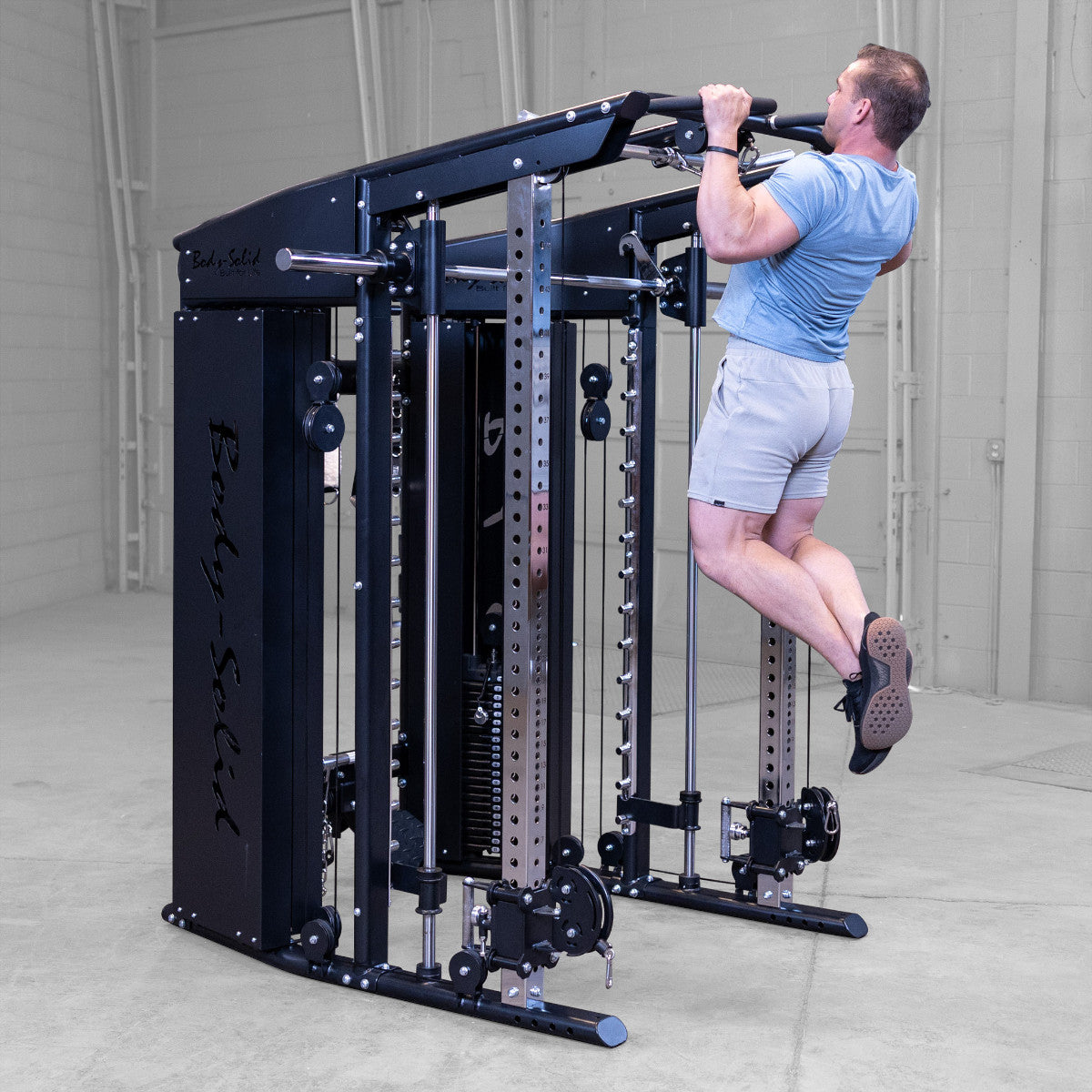Body-Solid GFSR100 All-in-One Smith Machine / Functional Trainer man exercising