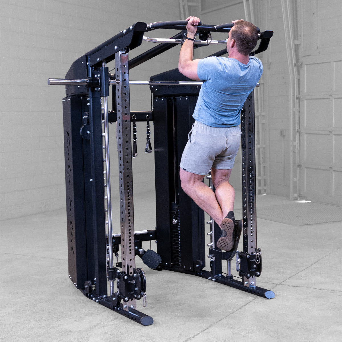 Body-Solid GFSR100 All-in-One Smith Machine / Functional Trainer man exercising