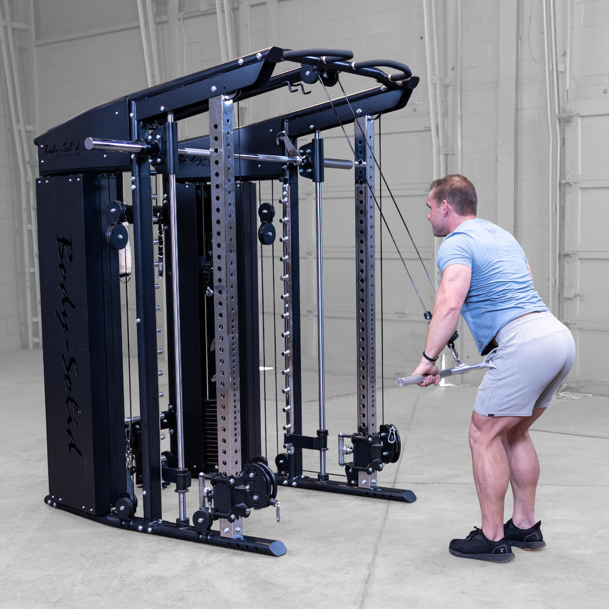 Body-Solid GFSR100 All-in-One Smith Machine / Functional Trainer man exercising
