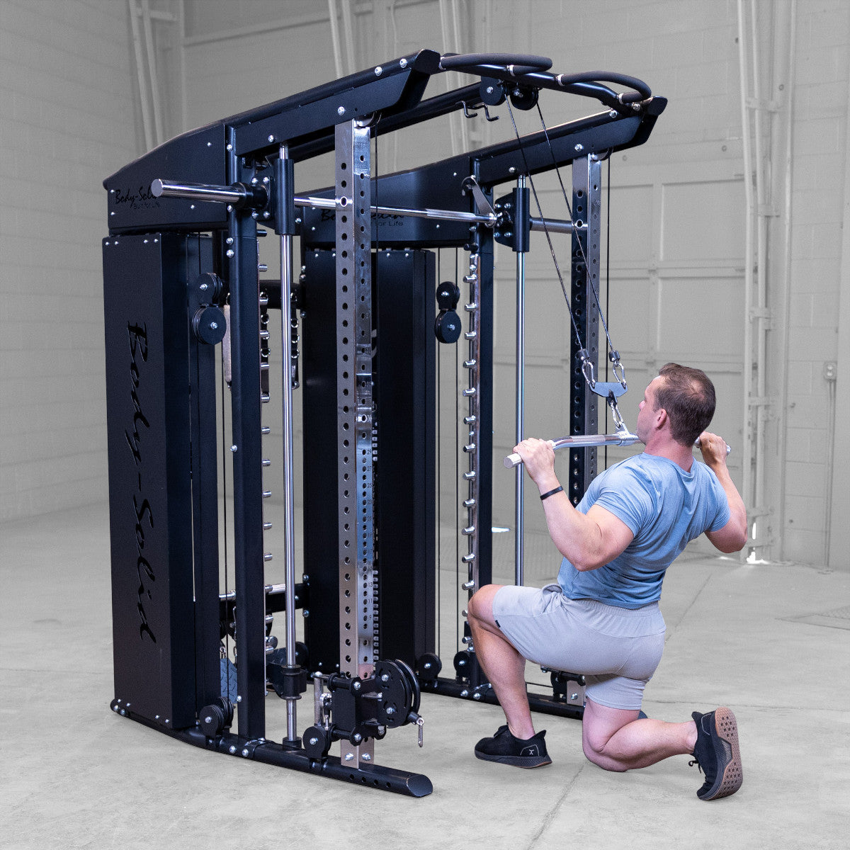 Body-Solid GFSR100 All-in-One Smith Machine / Functional Trainer man exercising