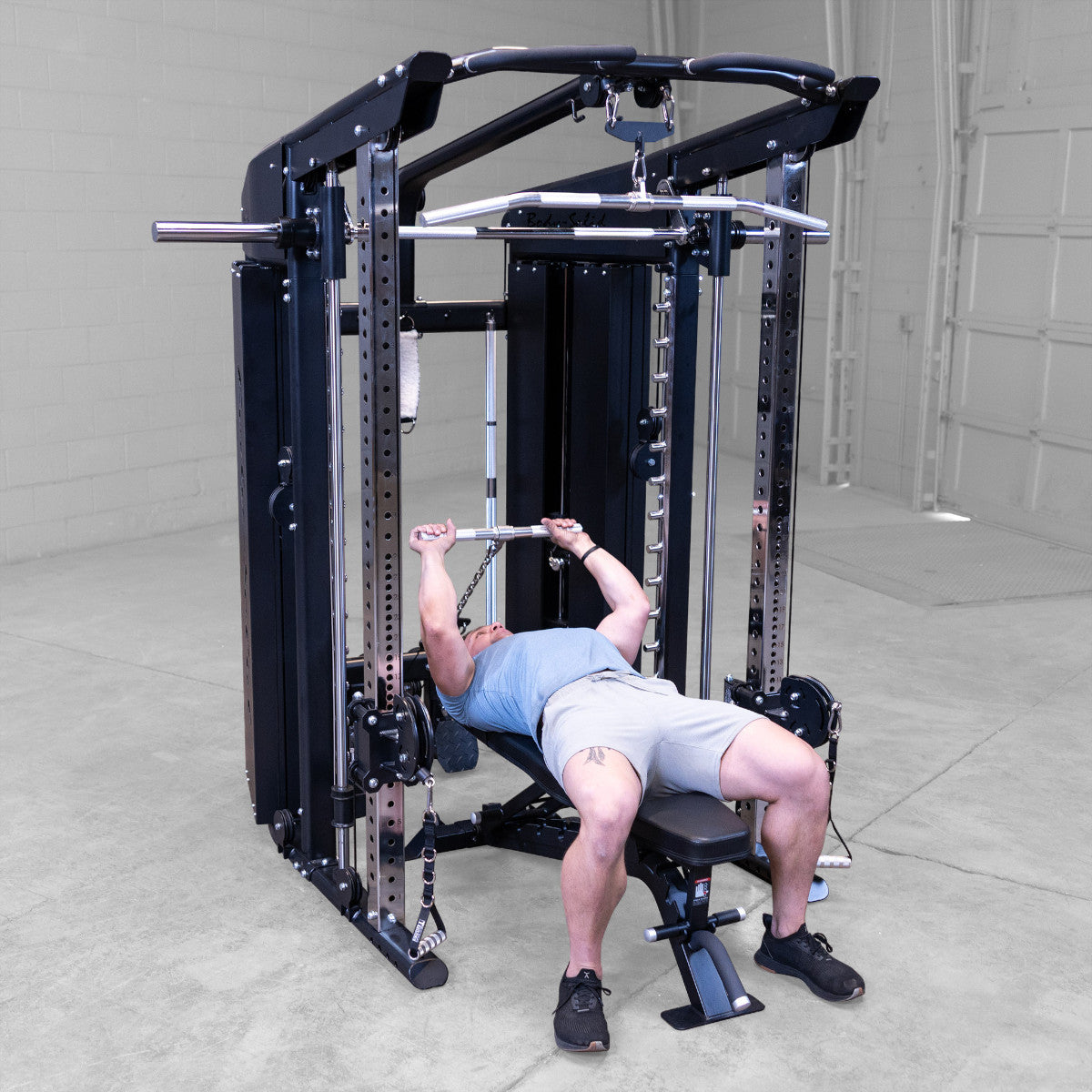 Body-Solid GFSR100 All-in-One Smith Machine / Functional Trainer man exercising