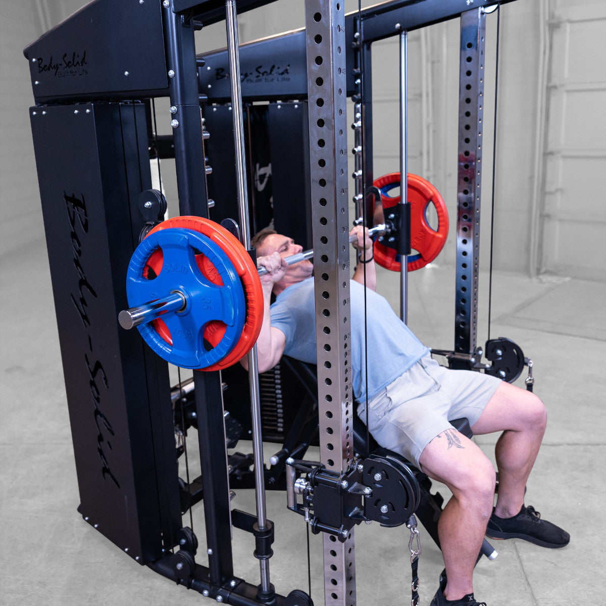 Body-Solid GFSR100 All-in-One Smith Machine / Functional Trainer man exercising