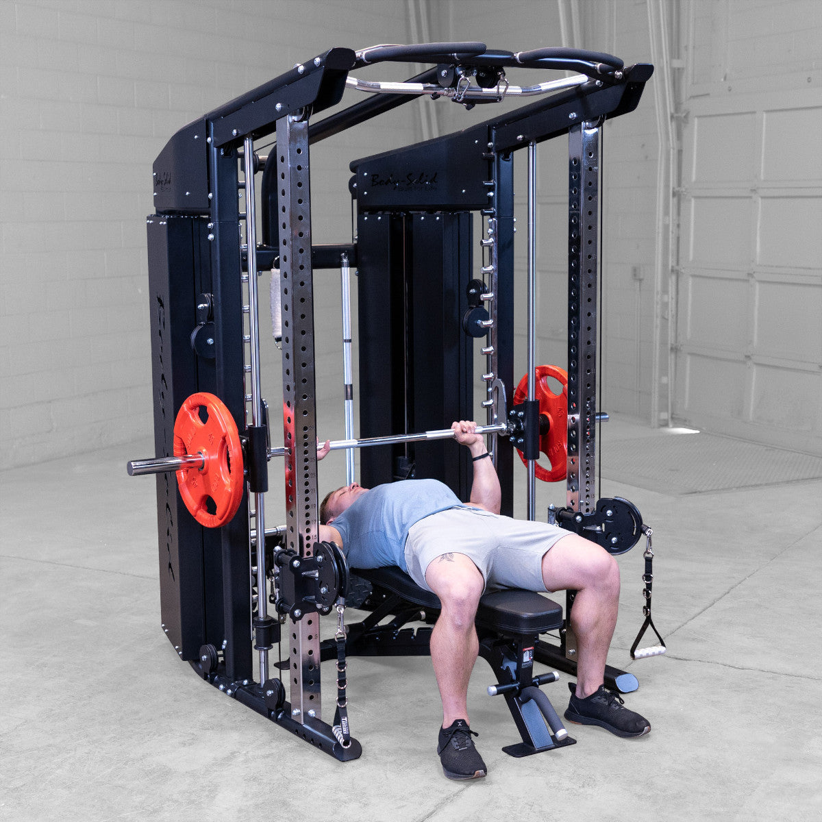 Body-Solid GFSR100 All-in-One Smith Machine / Functional Trainer man exercising