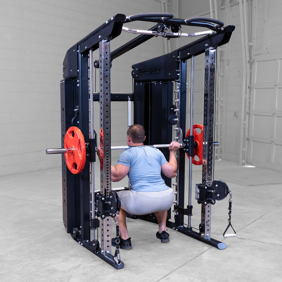 Body-Solid GFSR100 All-in-One Smith Machine / Functional Trainer man exercising