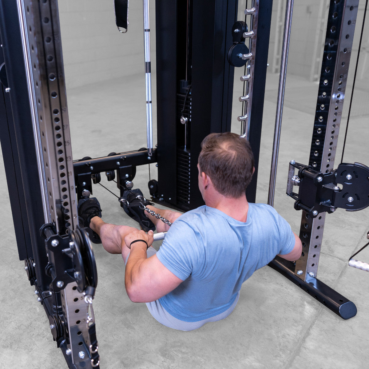 Body-Solid GFSR100 All-in-One Smith Machine / Functional Trainer man exercising