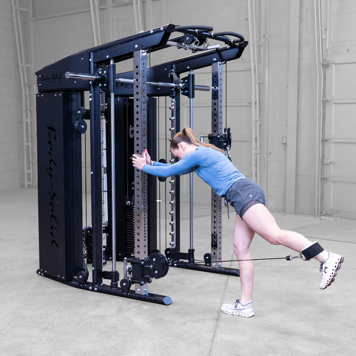 Body-Solid GFSR100 All-in-One Smith Machine / Functional Trainer woman exercising