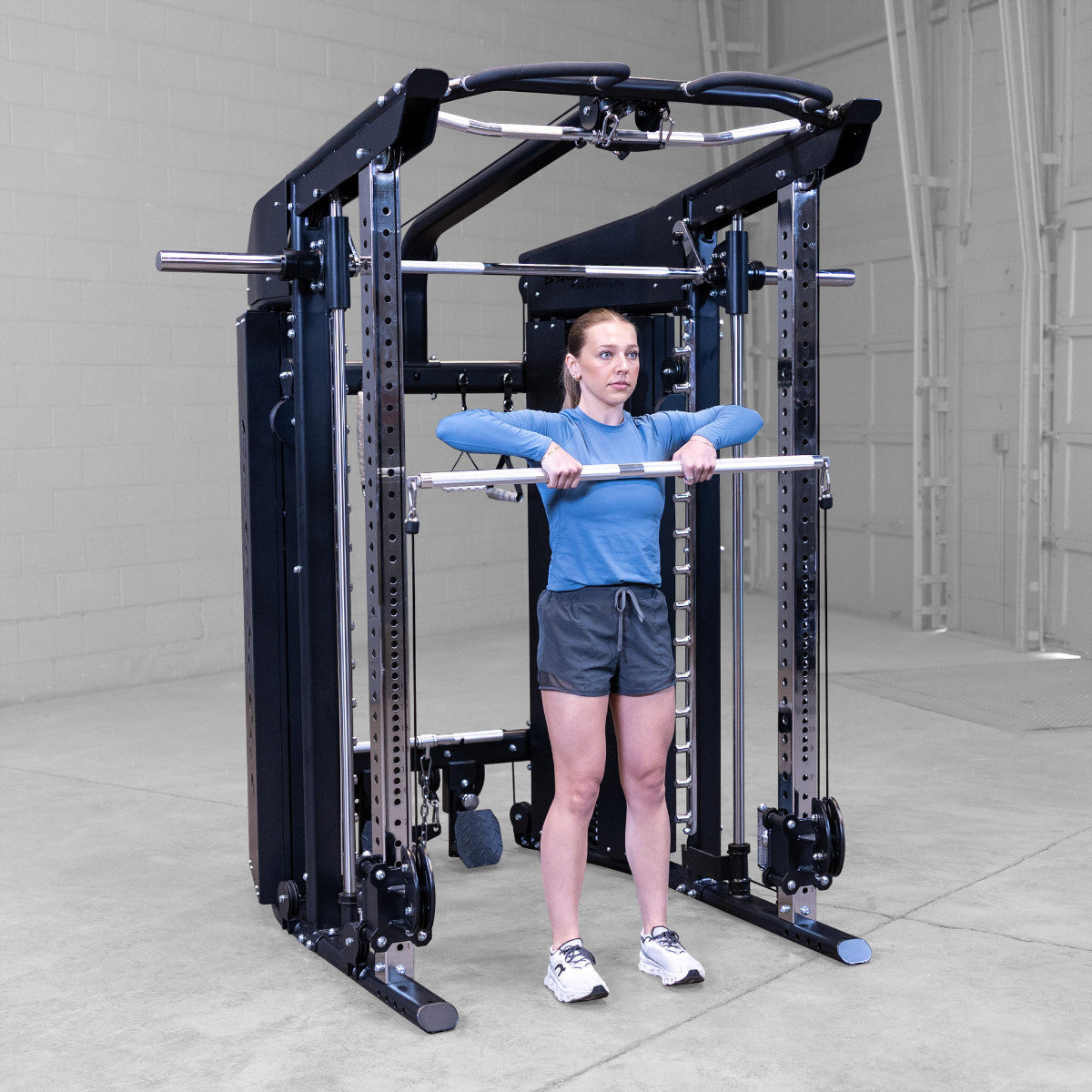 Body-Solid GFSR100 All-in-One Smith Machine / Functional Trainer woman exercising