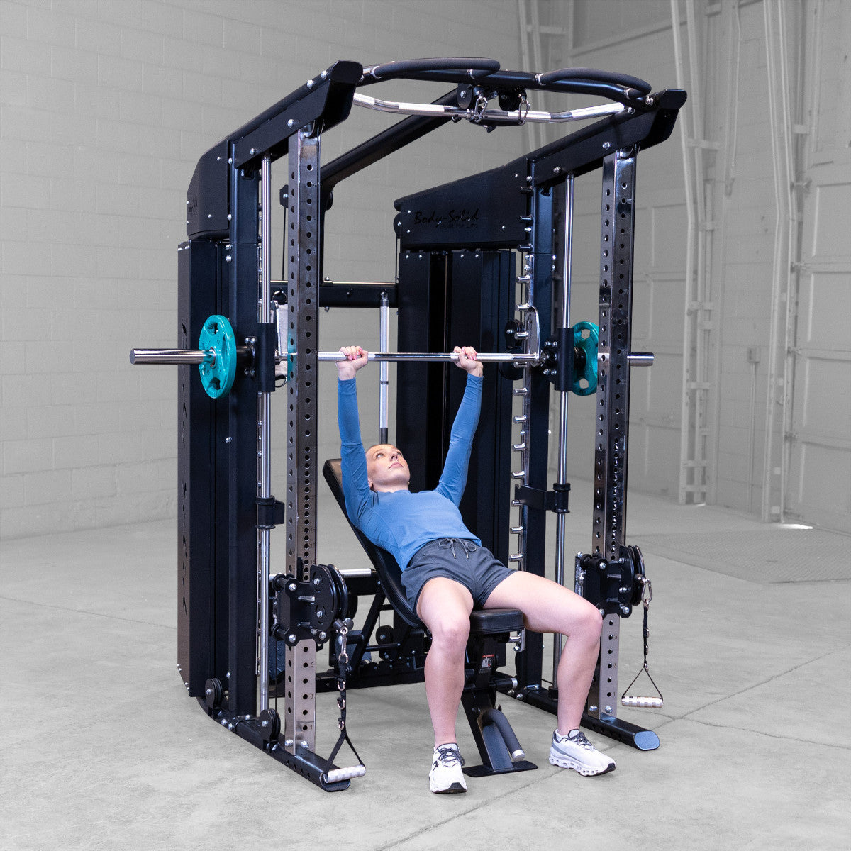 Body-Solid GFSR100 All-in-One Smith Machine / Functional Trainer man exercising