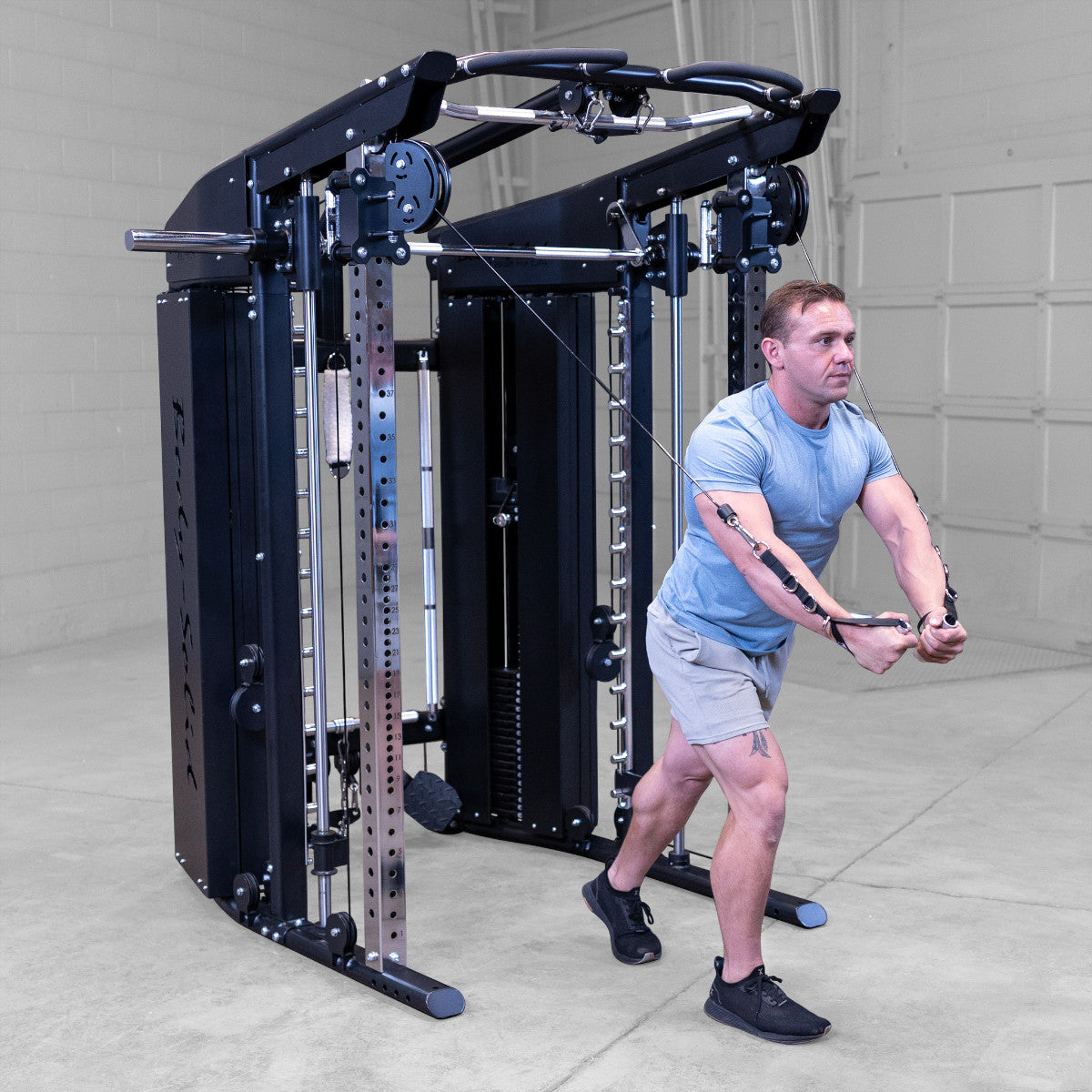 Body-Solid GFSR100 All-in-One Smith Machine / Functional Trainer man exercising