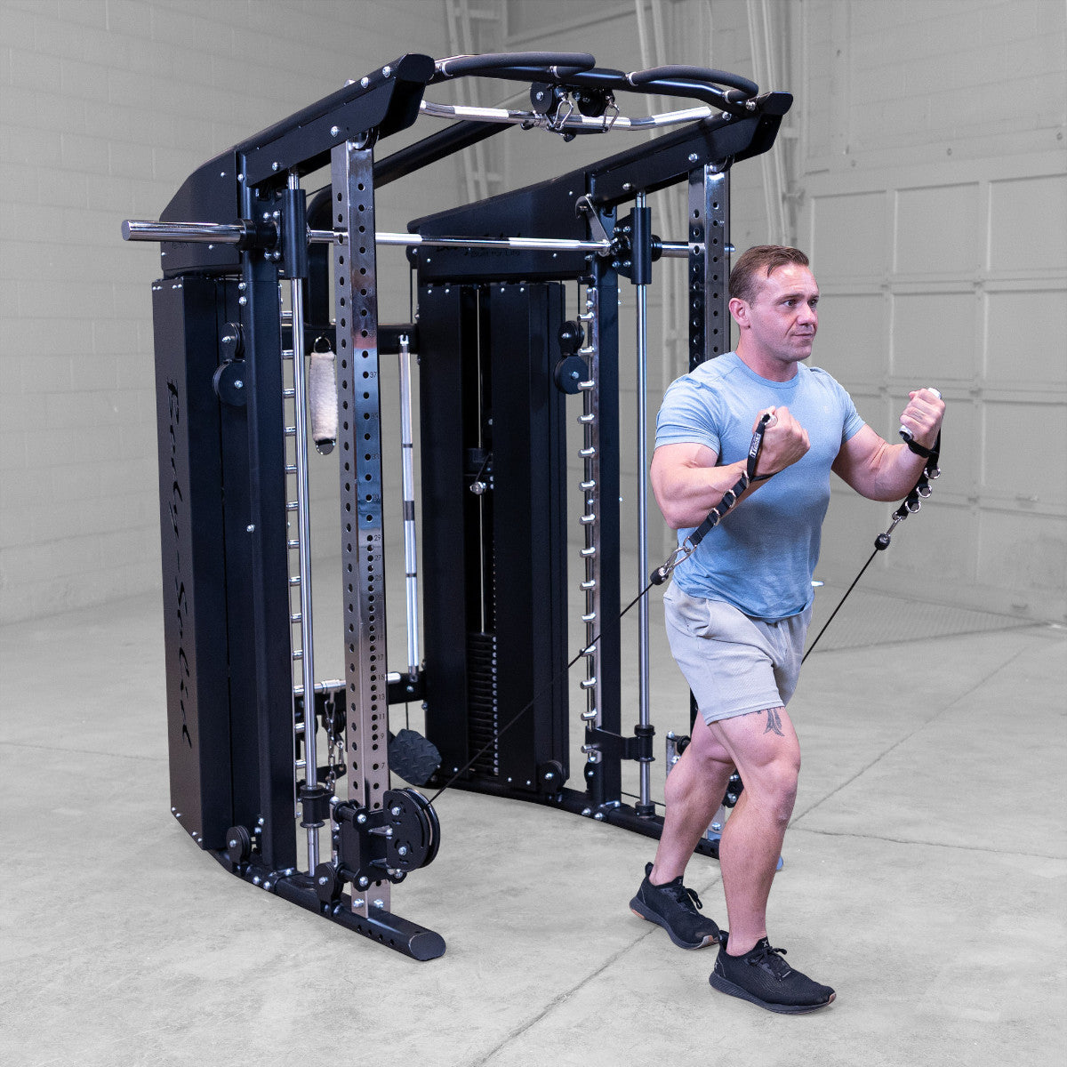 Body-Solid GFSR100 All-in-One Smith Machine / Functional Trainer man exercising