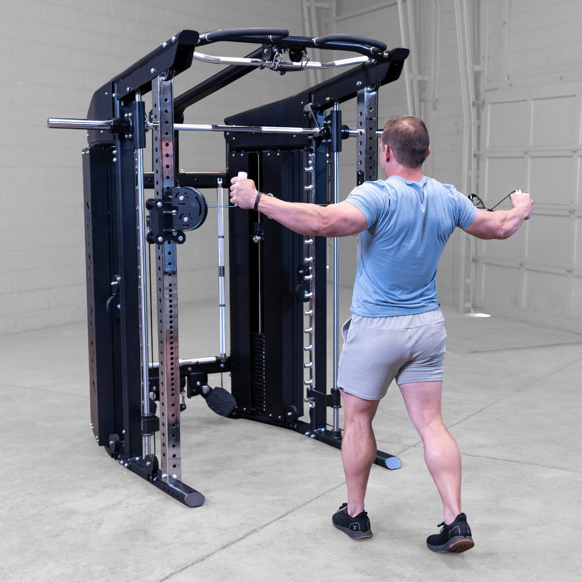 Body-Solid GFSR100 All-in-One Smith Machine / Functional Trainer man exercising