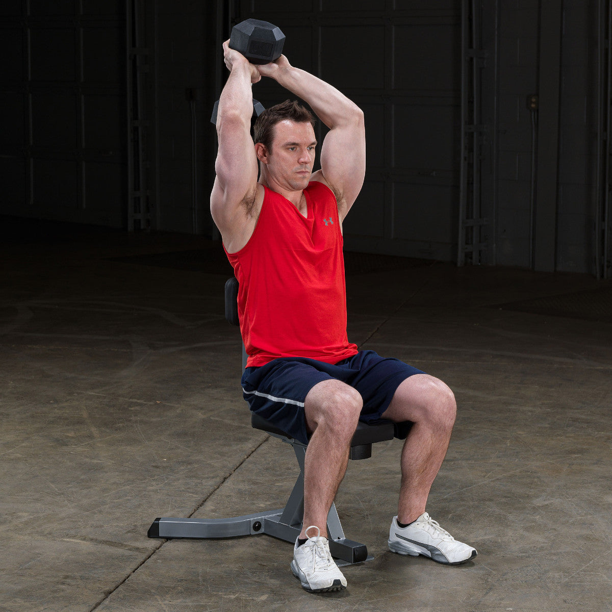 Body-Solid GST20B Utility Stool with man exercising