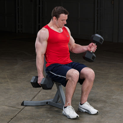 Body-Solid GST20B Utility Stool with man exercising
