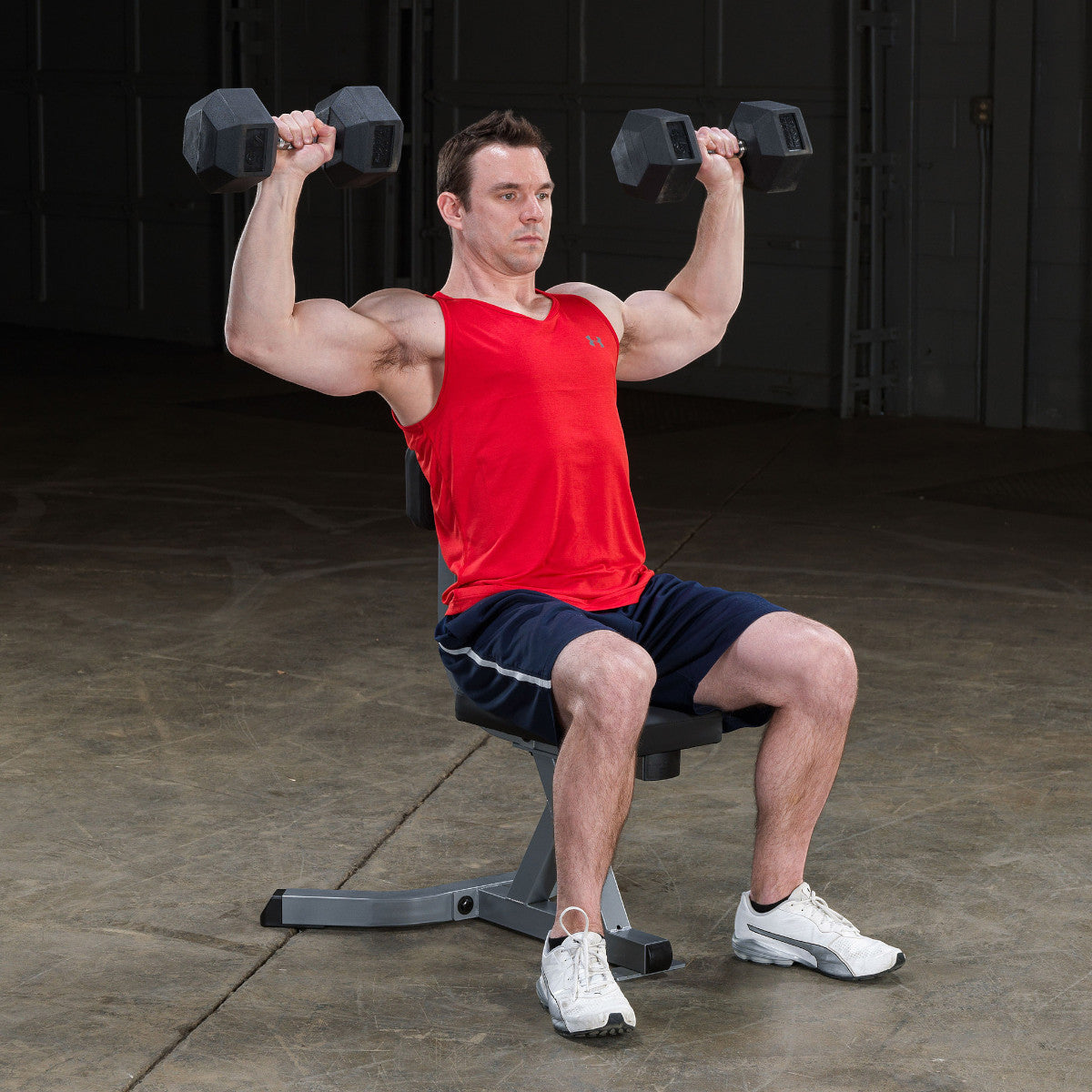 Body-Solid GST20B Utility Stool with man exercising