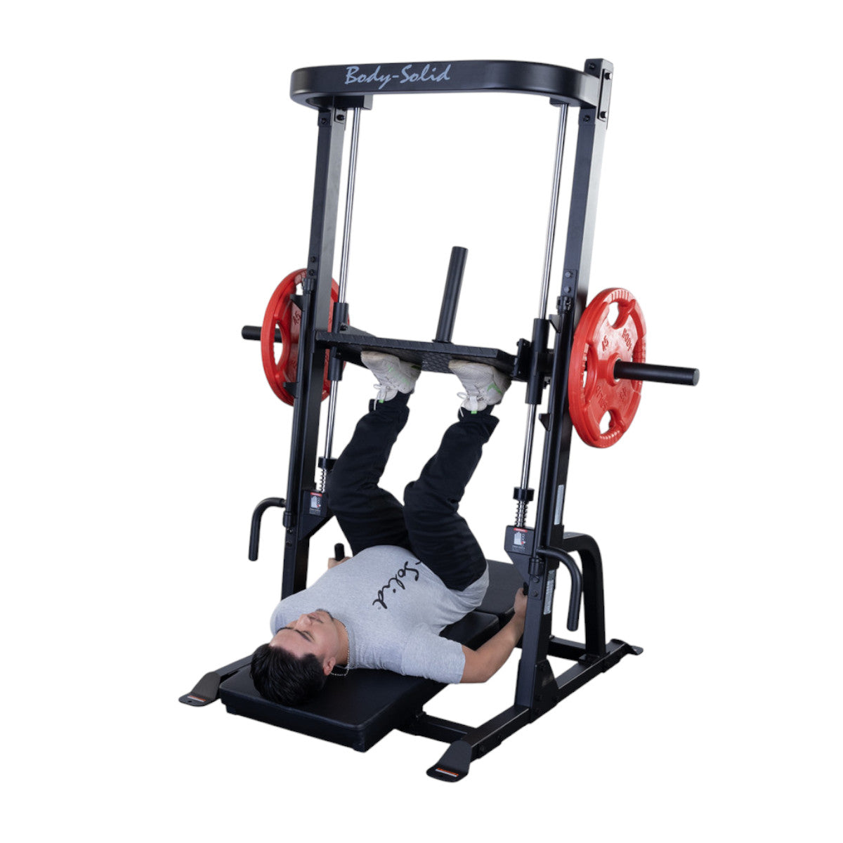 Body-Solid Body-Solid GVLP Vertical Leg Press man exercising white background