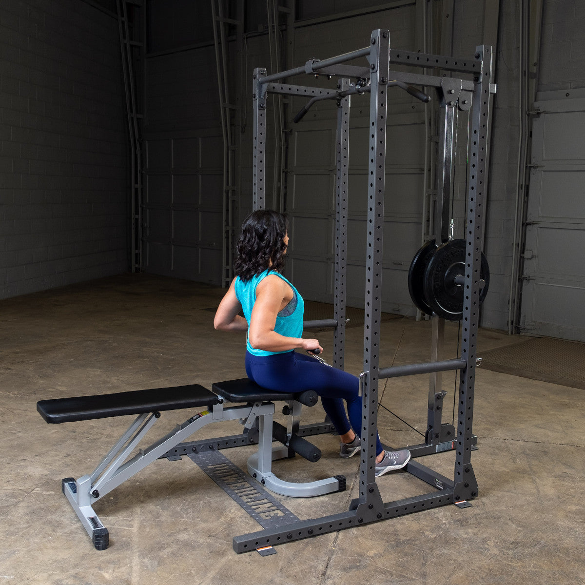 Body-Solid Powerline PPR500 Half Rack & PLA500 Lat Attachment with woman exercising