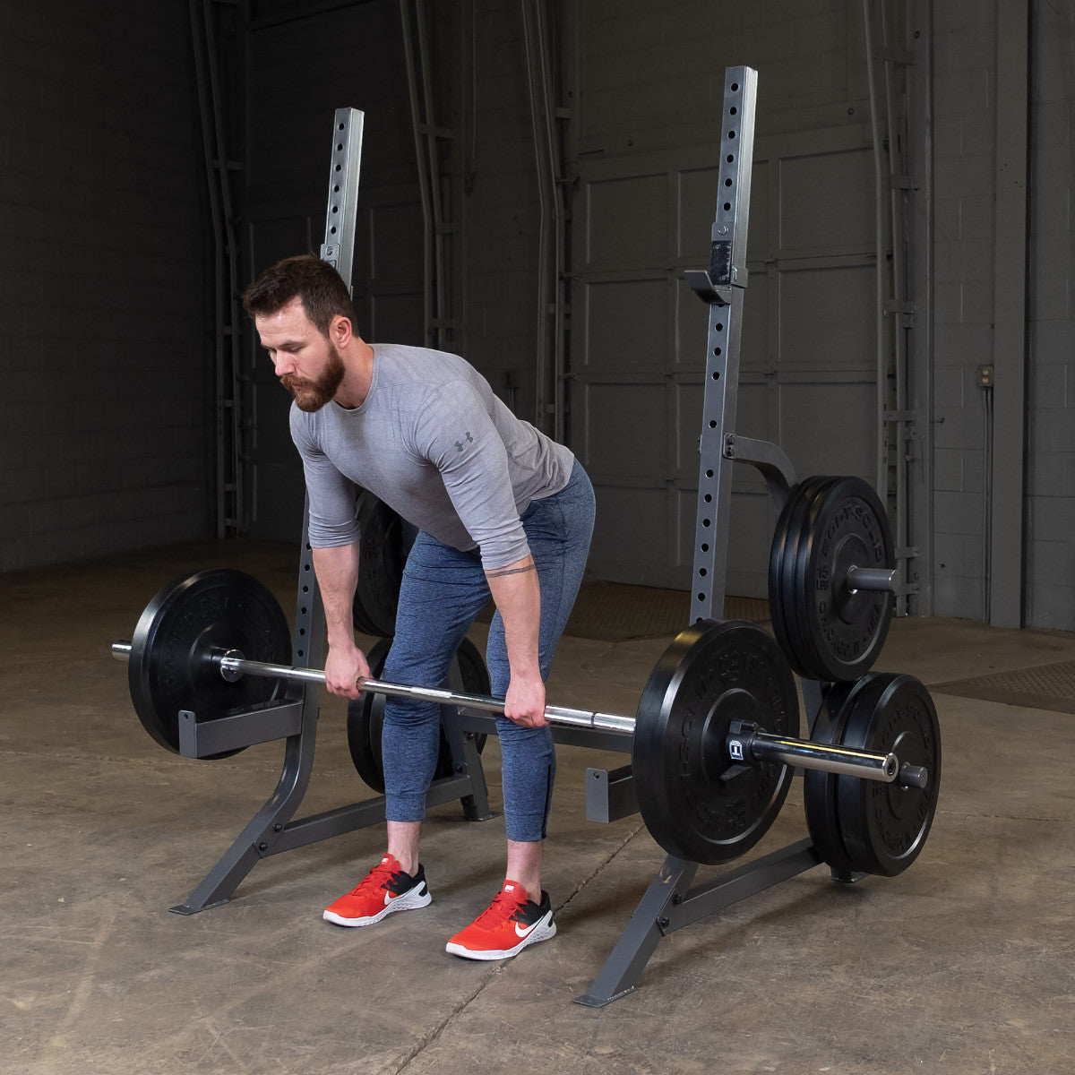 Body-Solid Powerline PMP150 Multi Press Rack man exercising