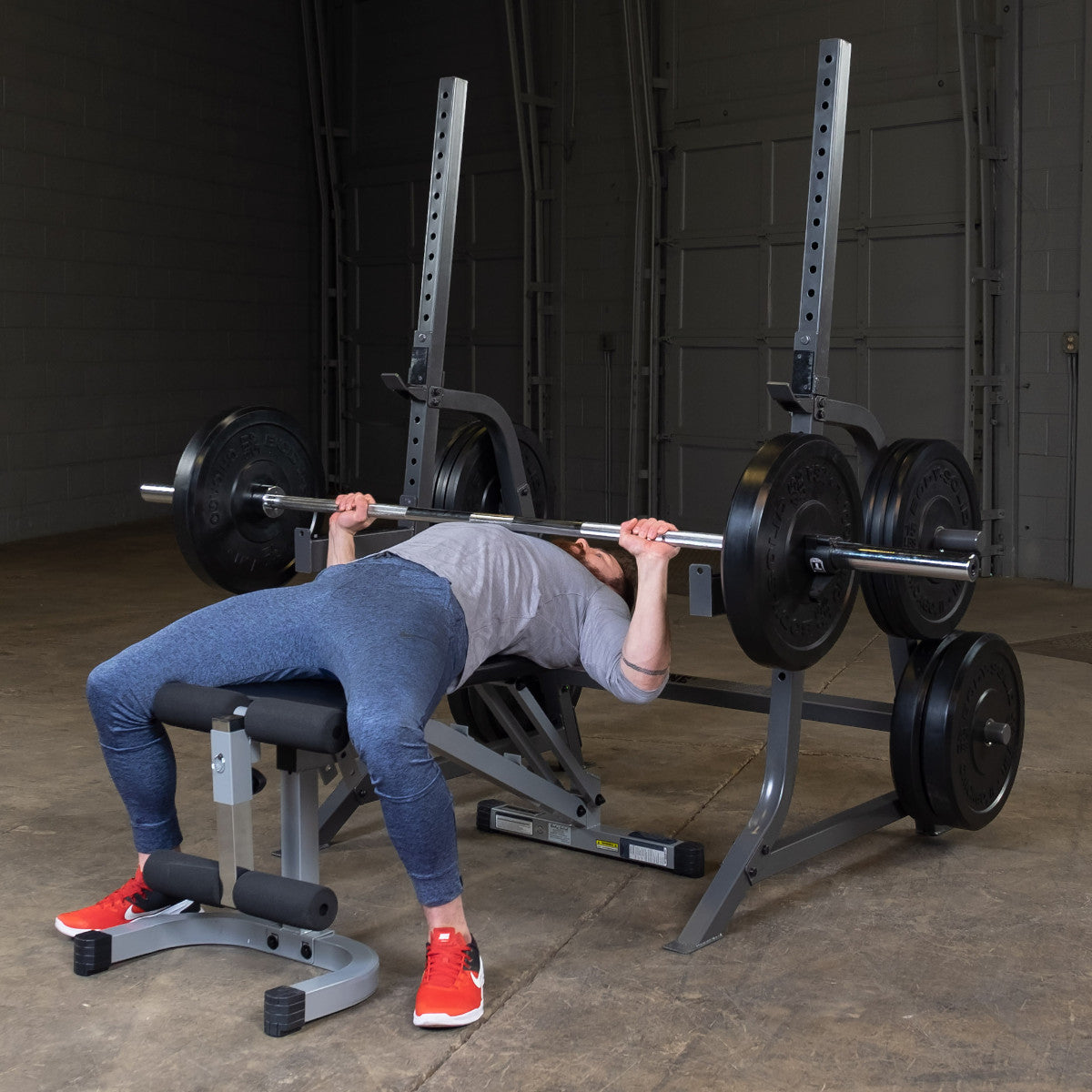 Body-Solid Powerline PMP150 Multi Press Rack man exercising