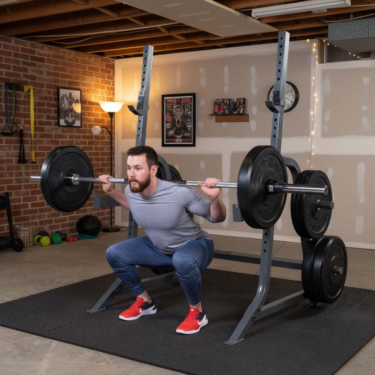 Body-Solid Powerline PMP150 Multi Press Rack man exercising in home basement gym