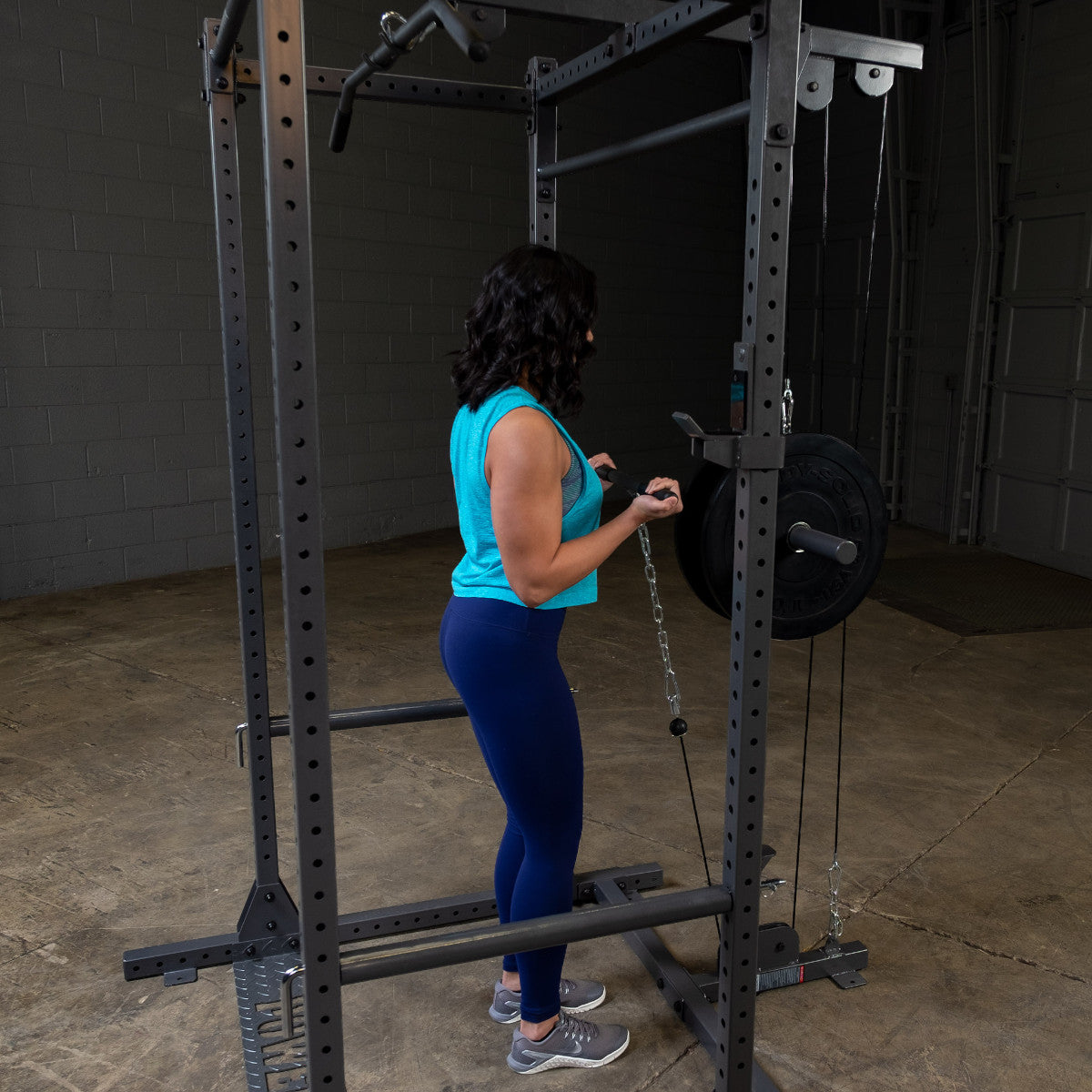 Body-Solid Powerline PPR1000 Power Rack with PLA1000 Lat Attachment woman exercising