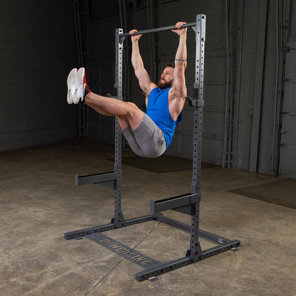 Body-Solid Powerline PPR500 Half Rack with man exercising
