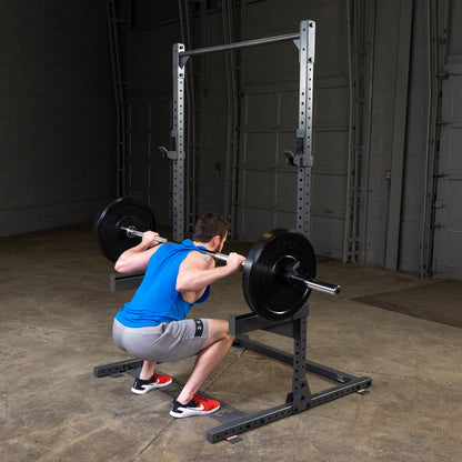 Body-Solid Powerline PPR500 Half Rack with man exercising