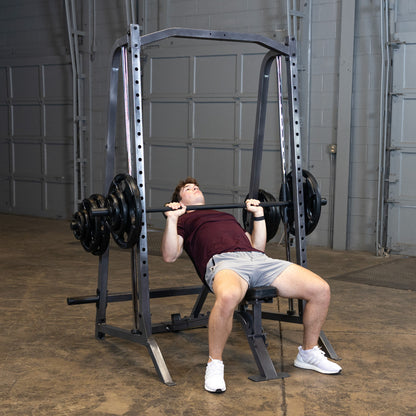 Body-Solid Powerline PSM200 Smith Machine man exercising