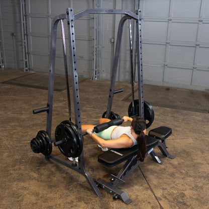 Body-Solid Powerline PSM200 Smith Machine woman exercising