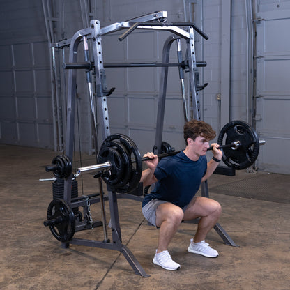 Body-Solid Powerline PSM200 Smith Machine man exercising