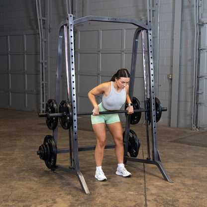 Body-Solid Powerline PSM200 Smith Machine woman exercising