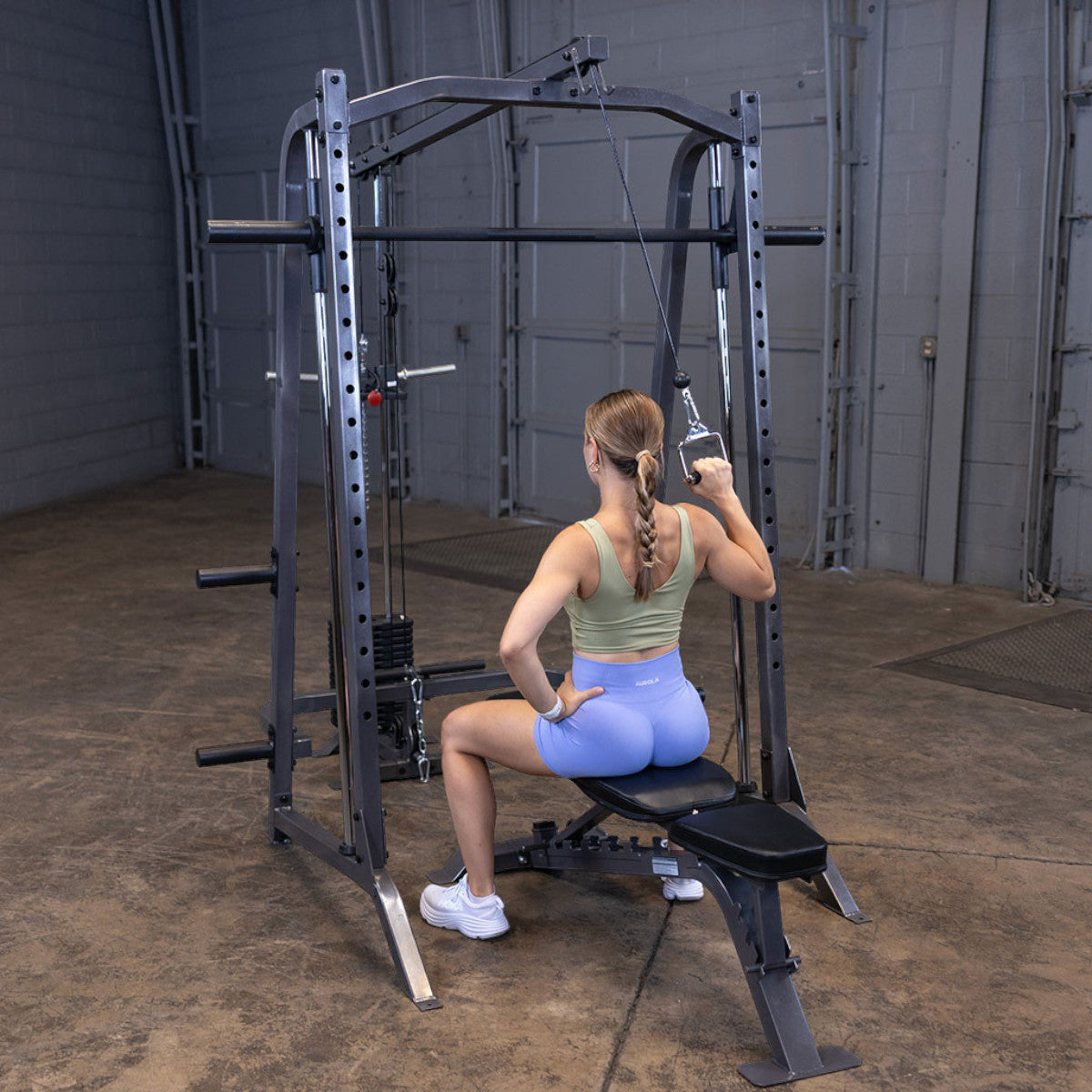 Body-Solid Powerline PSM200P4 Smith Machine Package woman exercising