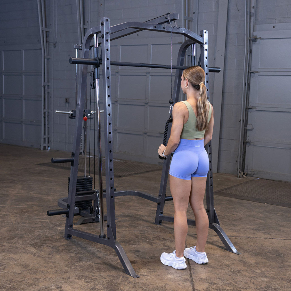 Body-Solid Powerline PSM200P4 Smith Machine Package woman exercising