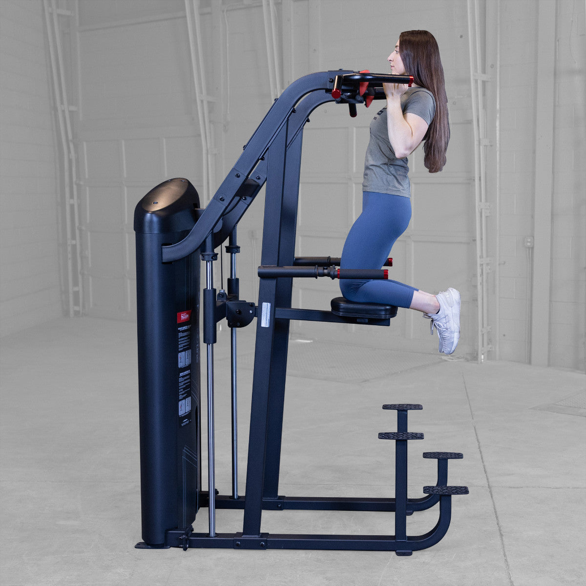 Body-Solid S2ACDX/2 Pro ClubLine Series 2 Weight Assisted Chin & Dip Machine woman exercising