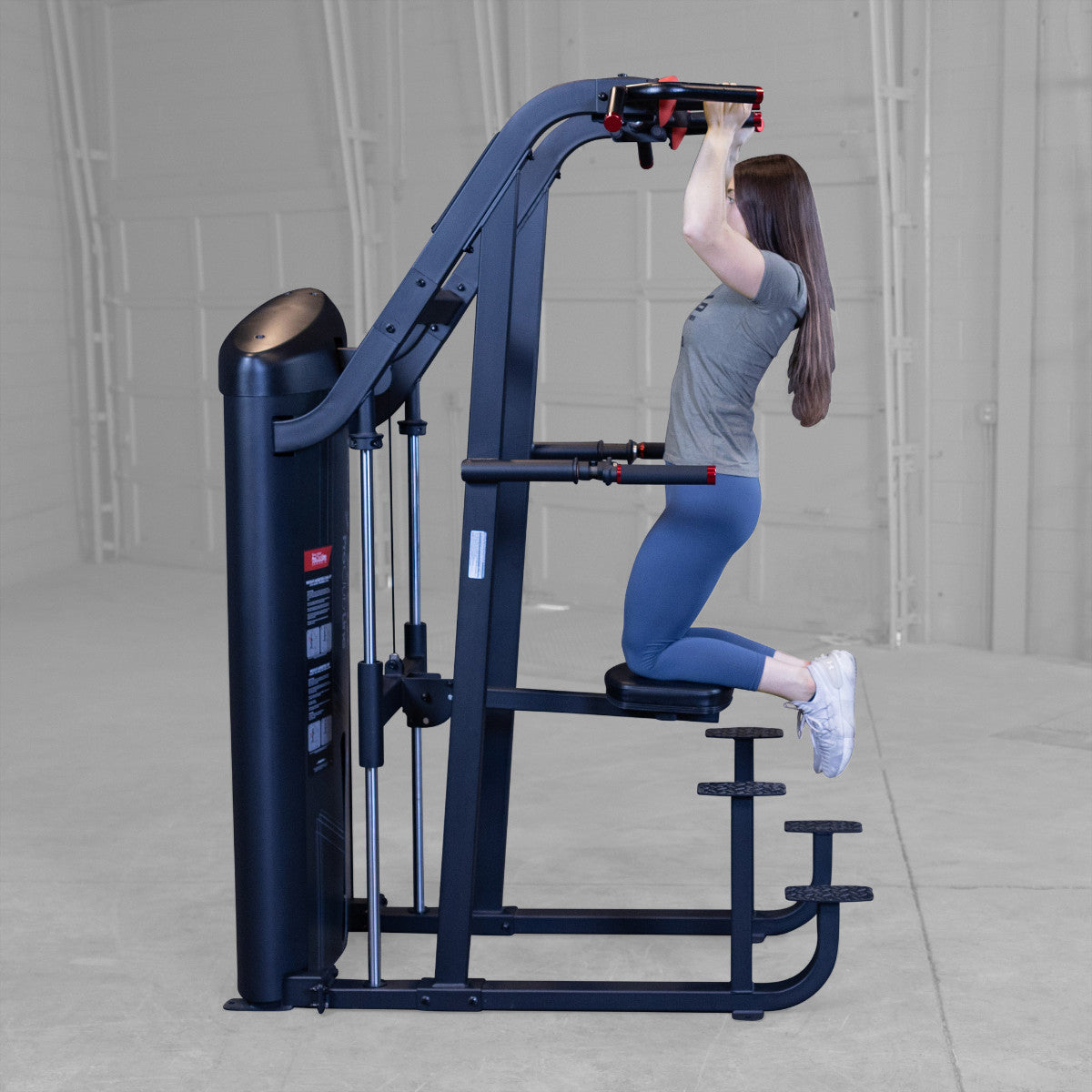 Body-Solid S2ACDX/2 Pro ClubLine Series 2 Weight Assisted Chin & Dip Machine woman exercising