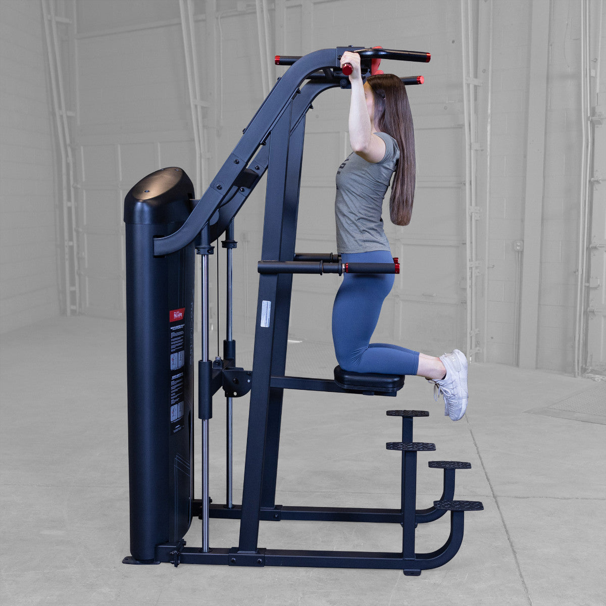 Body-Solid S2ACDX/2 Pro ClubLine Series 2 Weight Assisted Chin & Dip Machine woman exercising