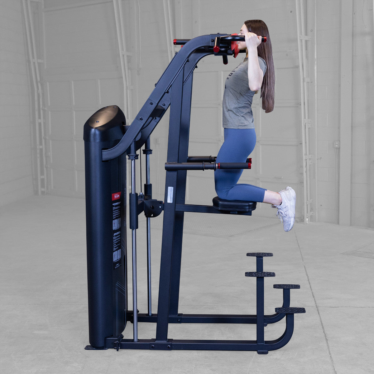 Body-Solid S2ACDX/2 Pro ClubLine Series 2 Weight Assisted Chin & Dip Machine woman exercising