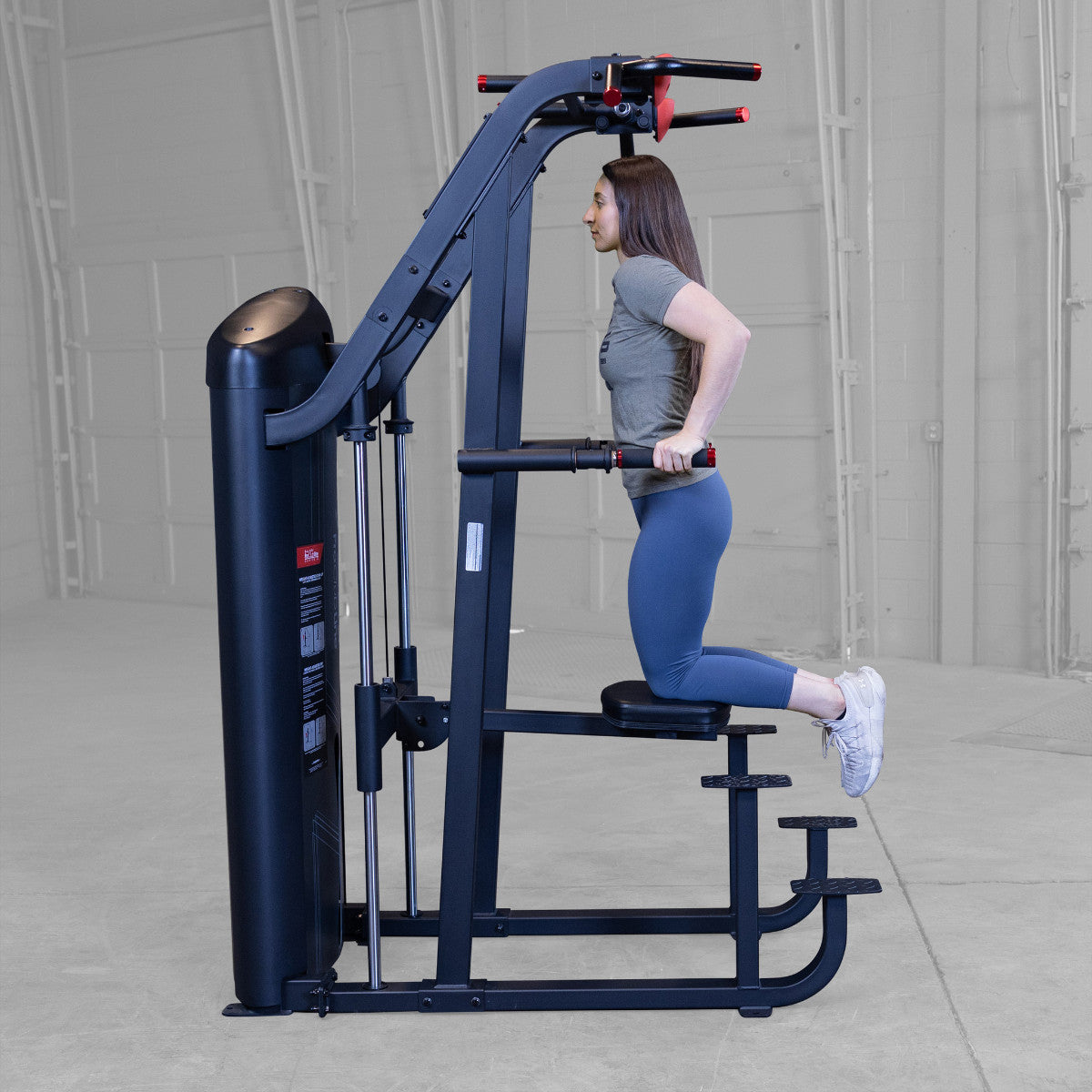 Body-Solid S2ACDX/2 Pro ClubLine Series 2 Weight Assisted Chin & Dip Machine woman exercising