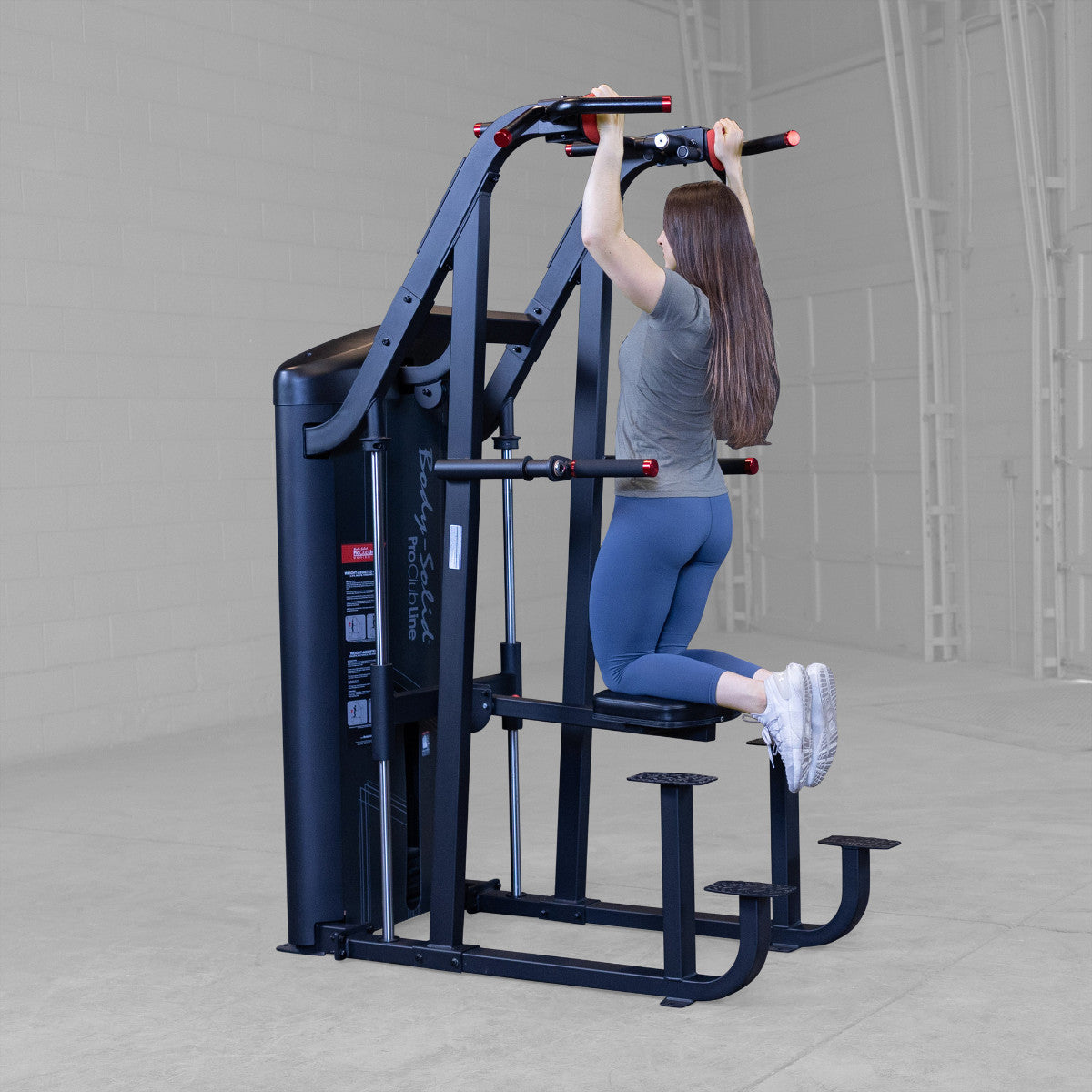 Body-Solid S2ACDX/2 Pro ClubLine Series 2 Weight Assisted Chin & Dip Machine woman exercising