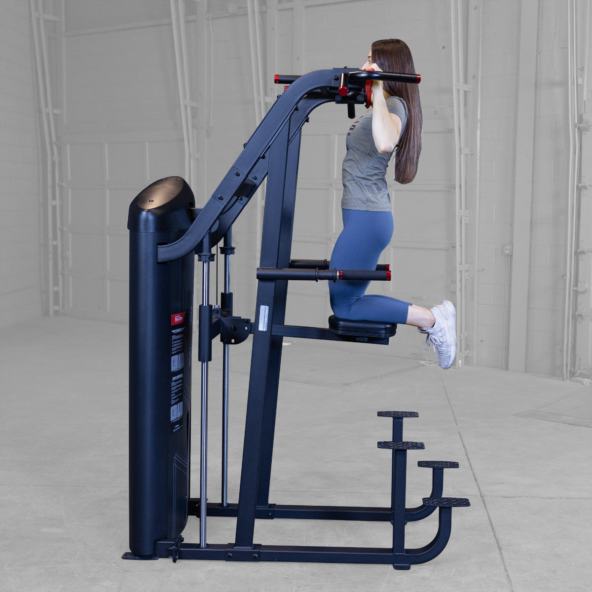 Body-Solid S2ACDX/2 Pro ClubLine Series 2 Weight Assisted Chin & Dip Machine woman exercising