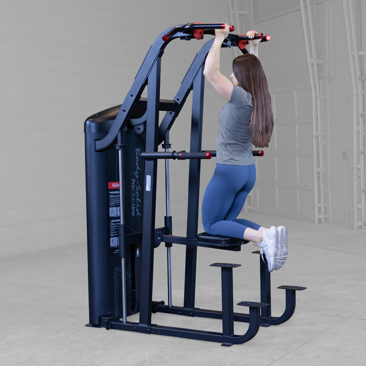 Body-Solid S2ACDX/2 Pro ClubLine Series 2 Weight Assisted Chin & Dip Machine woman exercising
