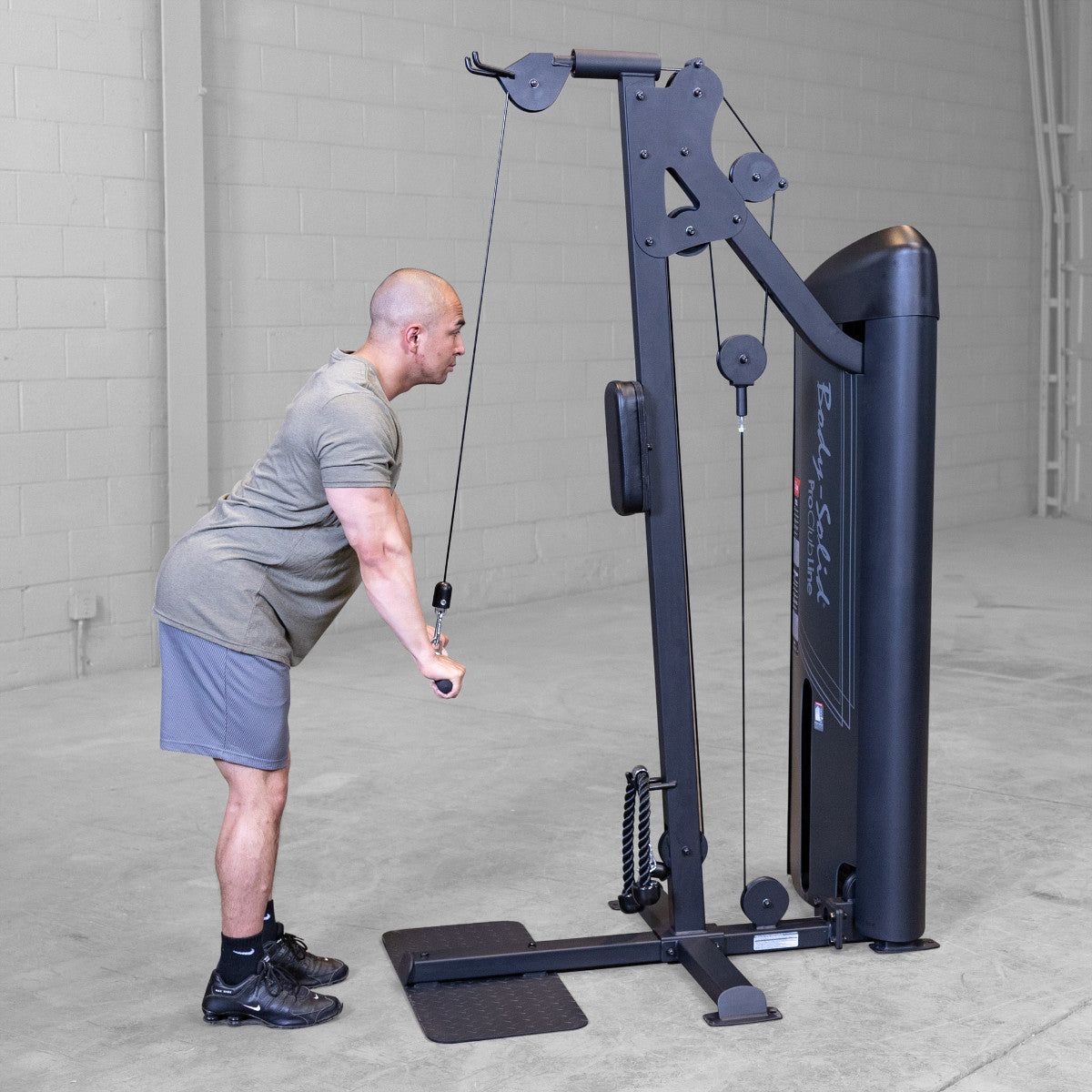 Body-Solid S2BTPX Pro ClubLine Series 2 Dual Bicep & Triceps Machine in gym with man exercising