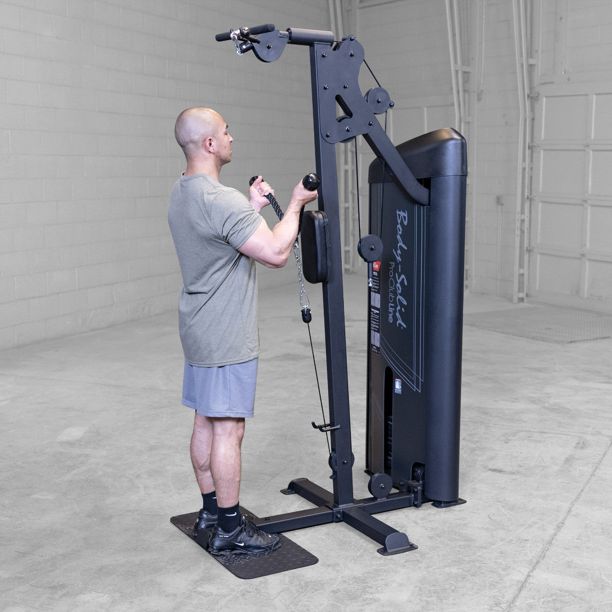 Body-Solid S2BTPX Pro ClubLine Series 2 Dual Bicep & Triceps Machine in gym with man exercising
